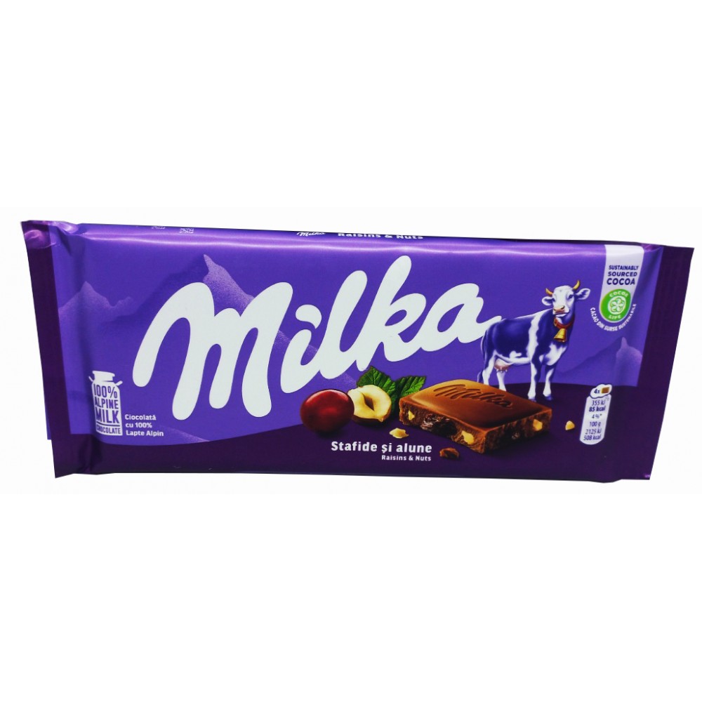 Молочний шоколад Milka з родзинками та лісовим горіхом 100 грам