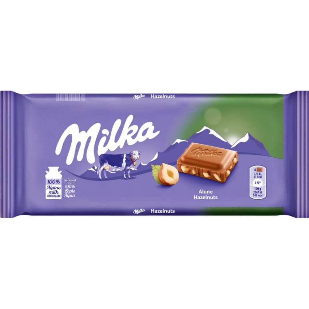 Шоколад молочний Milka Huzelnuts з подрібненим лісовим горіхом 100 грам